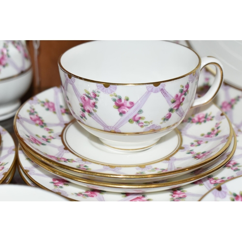 385 - A THIRTY SIX PIECE EARLY TWENTIETH CENTURY MINTON TEA SET, pattern no S50, printed and tinted with p... 