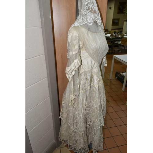 448 - A BESPOKE LATE 19TH CENTURY VICTORIAN SILK AND LACE WEDDING DRESS WITH ACCESSORIES, made for the mar... 