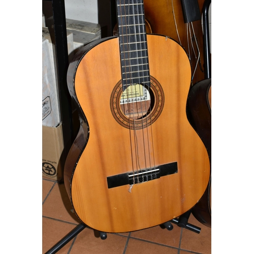 451 - A CELLO AND TWO ACOUSTIC GUITARS, comprising a Hungarian made cello, length of body 67cm, from scrol... 