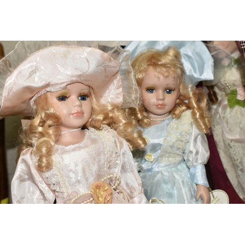 454 - FOUR BOXES OF COLLECTABLE LEONARDO COLLECTION  PORCELAIN DOLLS, to include thirty one dolls, all but... 