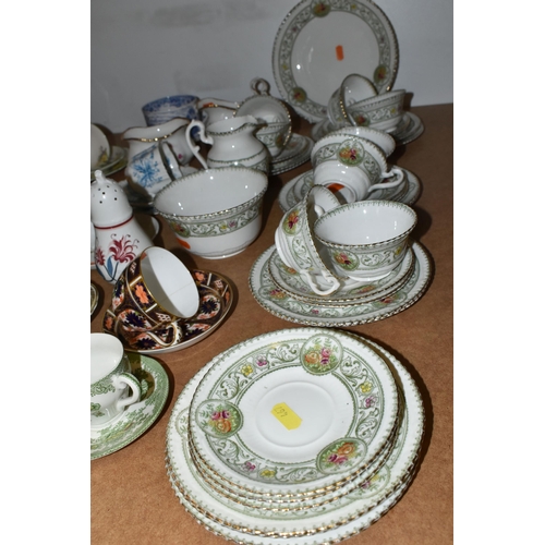 467 - A GROUP OF TEA WARES, to include a Belleek sugar bowl or preserve dish on a plated stand, teacups an... 