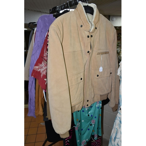 511 - A QUANTITY OF VINTAGE CLOTHING AND ACCESSORIES, to include a navy blue Barbour 'Beaufort' wax jacket... 