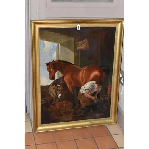 526 - 19TH CENTURY ENGLISH SCHOOL AFTER EDWIN LANDSEER, 'Shoeing a Bay Mare', a farrier is shoeing a horse... 