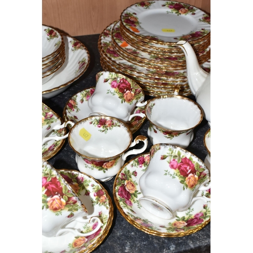 447 - A COLLECTION OF ROYAL ALBERT 'OLD COUNTRY ROSES' PATTERN TEAWARE, comprising teapot, nine tea cups, ... 