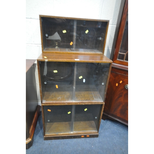 1209 - A MID CENTURY OAK THREE SECTION UNIX STACKING UNIT, width 55cm x depth 40cm x height 110cm, a glazed... 