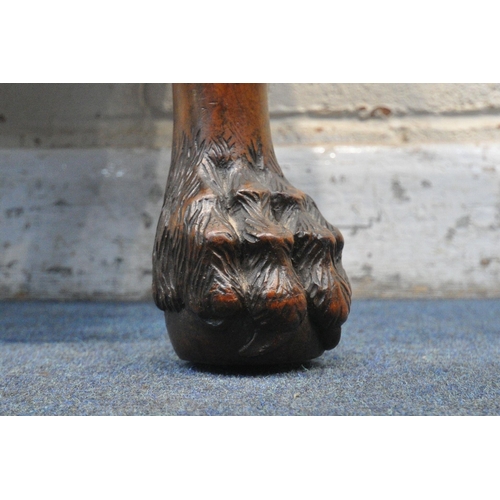 1213 - A REPRODUCTION OVAL WALNUT IRISH STOOL, with foliate drop in seat pad, on cabriole legs carved with ... 