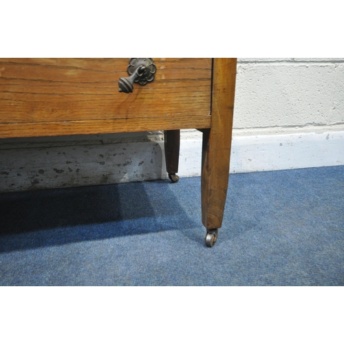 1214 - A 20TH CENTURY OAK CHEST OF THREE DRAWERS, on square tapered legs and ceramic castors, width 89cm x ... 