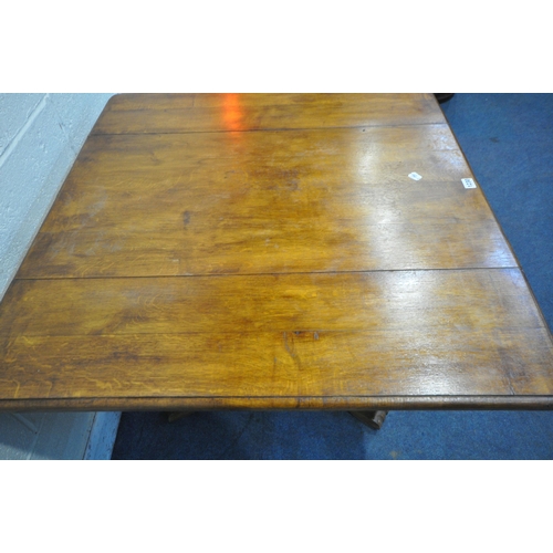 1230 - A BESPOKE 20TH CENTURY OAK DROP LEAF SOFA TABLE, with a drawer to each end, on turned and four legs,... 