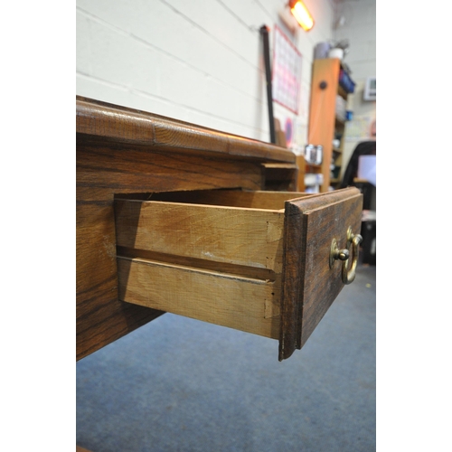 1230 - A BESPOKE 20TH CENTURY OAK DROP LEAF SOFA TABLE, with a drawer to each end, on turned and four legs,... 