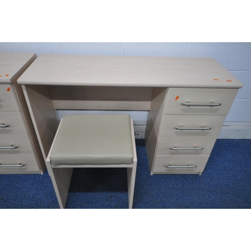 1238 - A MODERN BEECH EFFECT THREE PIECE BEDROOM SUITE, comprising a chest of eight drawers, length 113cm x... 