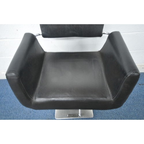 1244 - A BLACK LEATHER UPHOLSTERED REVOLVING 'DIR SALON' CHAIR, with a hydraulic foot pump, on a square bas... 