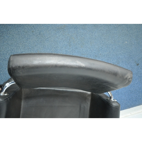 1244 - A BLACK LEATHER UPHOLSTERED REVOLVING 'DIR SALON' CHAIR, with a hydraulic foot pump, on a square bas... 