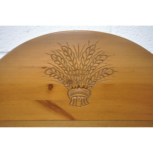 1247 - A MODERN PINE DRESSER, the top three tier plate rack with wheat decoration to crest, each shelf on b... 