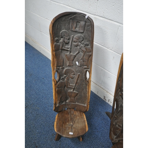 1254 - TWO AFRICAN HARDWOOD BIRTHING CHAIRS, largest chair carved with three mother and baby figures, width... 