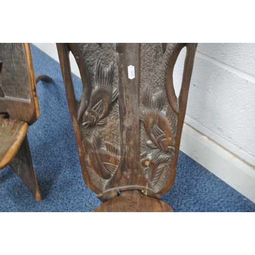 1254 - TWO AFRICAN HARDWOOD BIRTHING CHAIRS, largest chair carved with three mother and baby figures, width... 