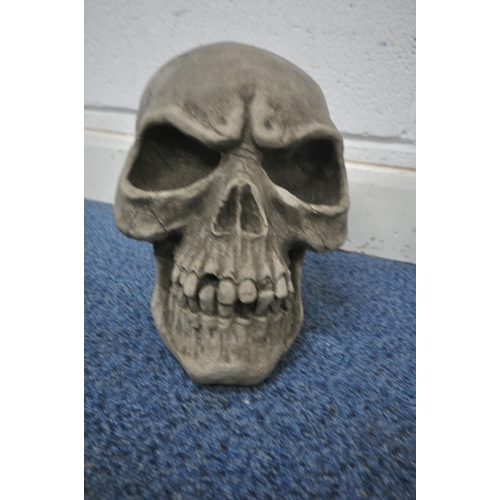 1260 - A PAIR OF MODERN COMPOSITE SCULPTURES OF SKULLS , width 23cm x depth 30cm x height 26cm (condition r... 