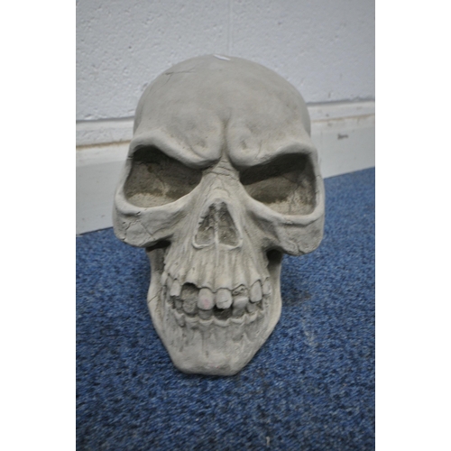 1260 - A PAIR OF MODERN COMPOSITE SCULPTURES OF SKULLS , width 23cm x depth 30cm x height 26cm (condition r... 