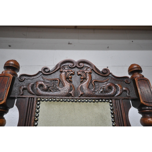 1270 - AN EDWARDIAN OAK WIND OUT DINING TABLE, with canted corners, turned and fluted legs, on ceramic cast... 