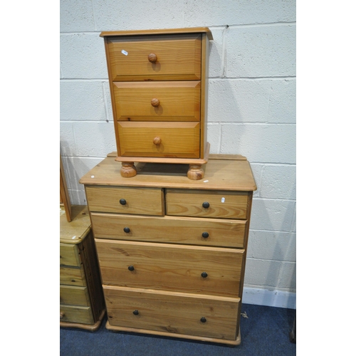 1340 - A SELECTION OF MODERN PINE BEDROOM FURNITURE, to include a chest of two short over three long drawer... 