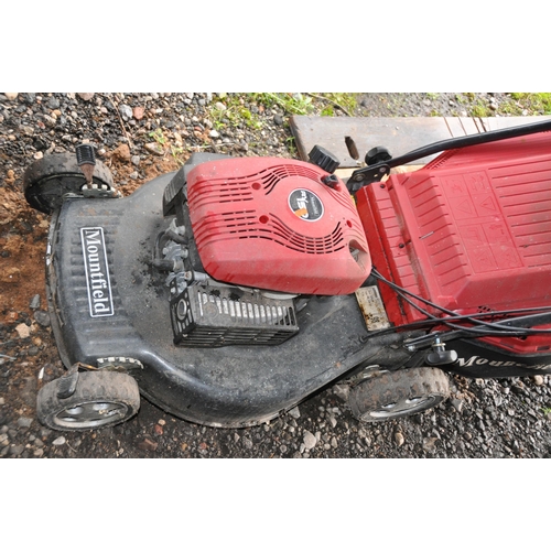 1004 - A MOUNTFIELD SP534 SELF PROPELLED PETROL LAWN MOWER with grass box (engine pulls freely but hasn't s... 