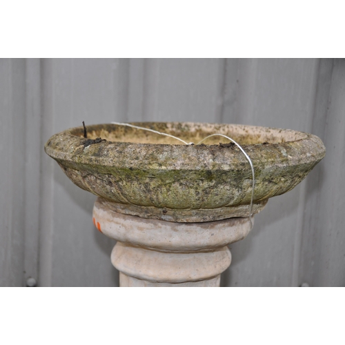 1006 - A MODERN COMPOSITE BIRD BATH on a Corinthian column 78cm high Condition Report: no apparent cracks o... 