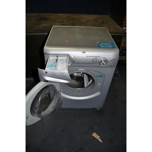 1080 - A HOTPOINT WF326 WASHING MACHINE in silver width 60cm depth 60cm height 87cm (PAT pass, powers up, s... 