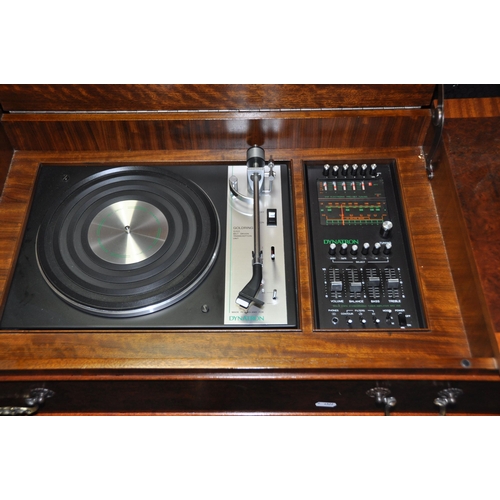 1084 - A DYNATRON SRX29A RADIO GRAM in a Queen Anne style  Walnut cabinet with a Goldring G101 turntable (n... 