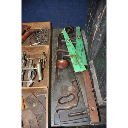 1109 - A LARGE VINTAGE CARPENTERS TOOLBOX CONTAINING CARPENTRY TOOLS with as steel banded lid  two inner li... 