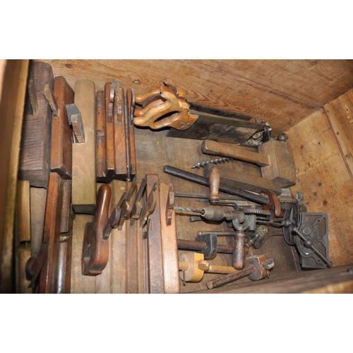 1109 - A LARGE VINTAGE CARPENTERS TOOLBOX CONTAINING CARPENTRY TOOLS with as steel banded lid  two inner li... 