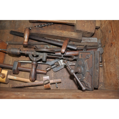 1109 - A LARGE VINTAGE CARPENTERS TOOLBOX CONTAINING CARPENTRY TOOLS with as steel banded lid  two inner li... 