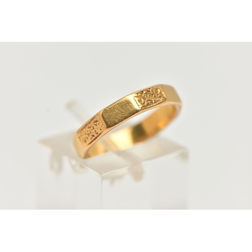 14 - A 22CT GOLD BAND RING, a decagon style band ring with etched scrolling detail, approximate band widt... 