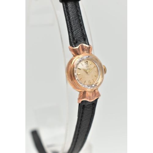 39 - A LADYS 9CT GOLD, 'OMEGA' CANDY WRISTWATCH, manual wind, round champagne dial signed 'Omega', Arabic... 