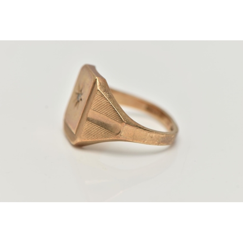 100 - A GENTS 9CT GOLD DIAMOND SET SIGNET RING, rectangular signet set with a central star set single cut ... 