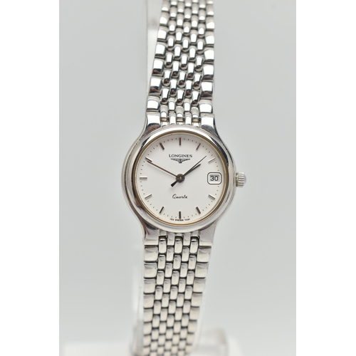 107 - TWO WRISTWATCHES, the first a boxed a ladys quartz movement, round white dial, signed Longines, bato... 