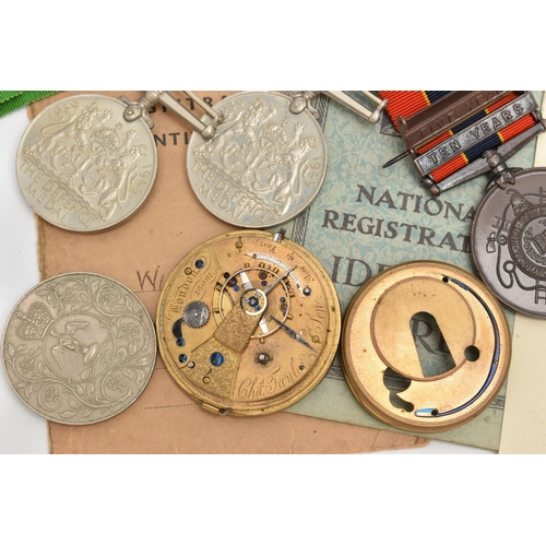 114 - AN ASSORTMENT OF WWII MEDALS AND NATIONAL REGISTRATION IDENTITY CARDS, three service medals, a comme... 