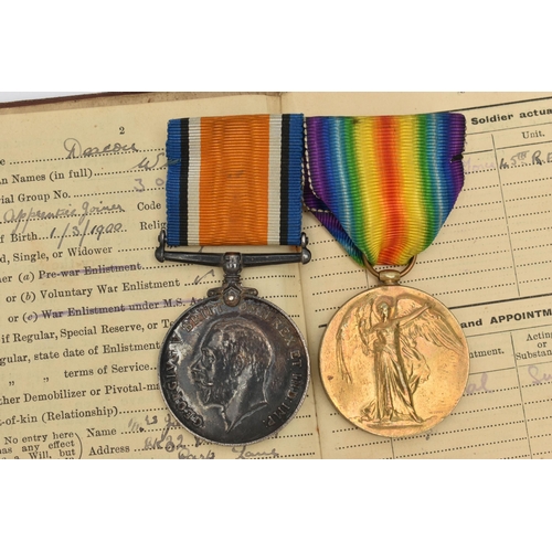 115 - TWO WWI MEDALS AND A SOLDIERS SERVICE BOOK, two medals awarded to 4612 PTE. W. DEACON. W. YORK. R. t... 