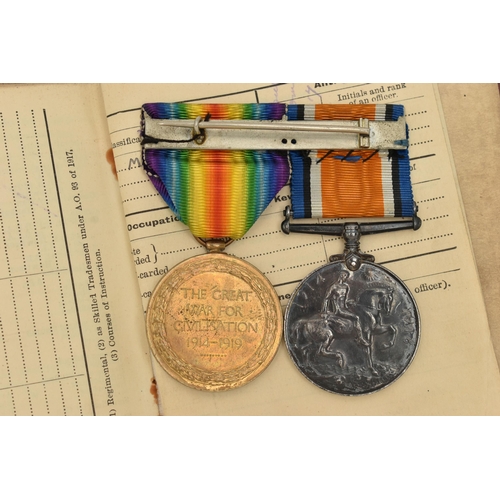 115 - TWO WWI MEDALS AND A SOLDIERS SERVICE BOOK, two medals awarded to 4612 PTE. W. DEACON. W. YORK. R. t... 