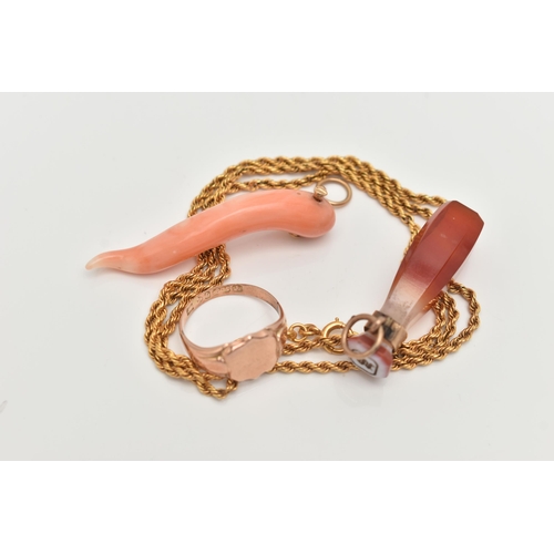 74 - FOUR ITEMS OF JEWELLERY, to include a carved coral Italian horn pendant, fitted with a yellow metal ... 