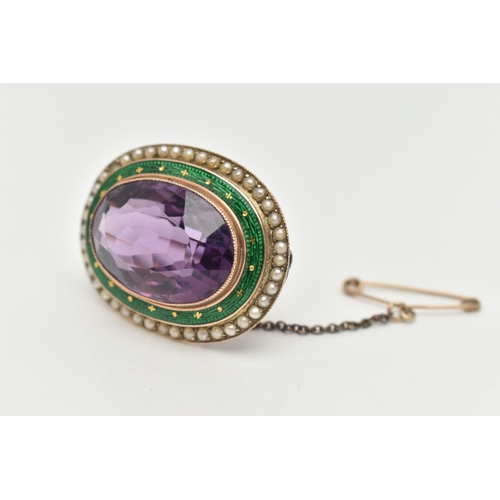 76 - A YELLOW METAL GEM AND ENAMEL BROOCH, of an oval form, set with a large oval cut amethyst, within a ... 