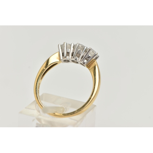 96 - AN 18CT GOLD DIAMOND THREE STONE RING, three round brilliant cut diamonds, each claw set in a white ... 