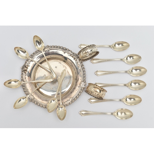 130 - A SELECTION OF SILVER ITEMS, to include a round tray, with shell detail and gadrooned rim, hallmarke... 