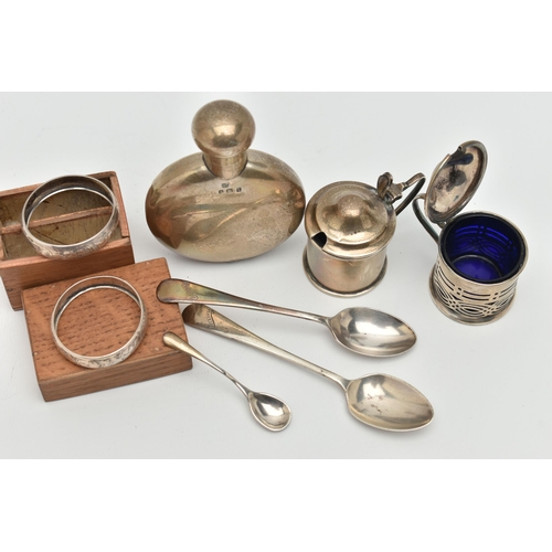 131 - A SELECTION OF EARLY 20TH CENTURY SILVERWARE, to include a pair of silver napkin rings engraved in s... 