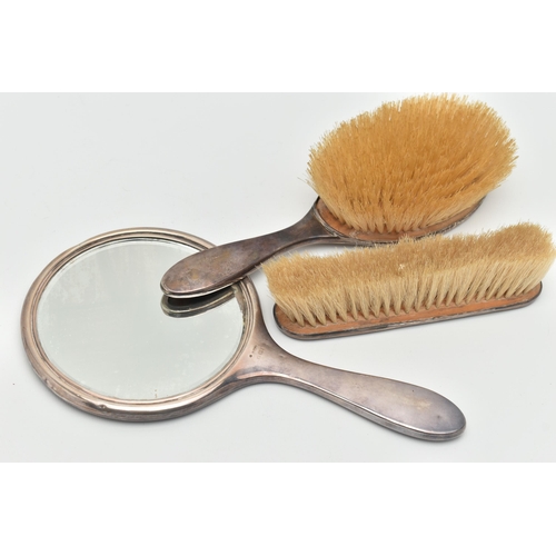 132 - A SILVER AND TORTOISESHELL THREE PIECE VANITY SET, comprising of a hair brush, clothes brush and a h... 