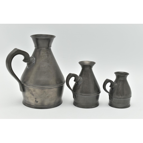 134 - A SET OF THREE PEWTER HAYSTACK MEASURES, largest measuring approximately 150mm height, smallest meas... 