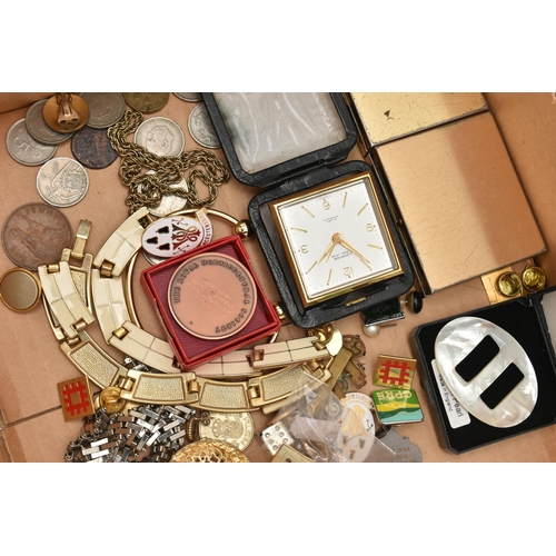 146 - A BOX OF ASSORTED ITEMS, to include various travel clocks, pin badges, costume earrings, chains, sma... 