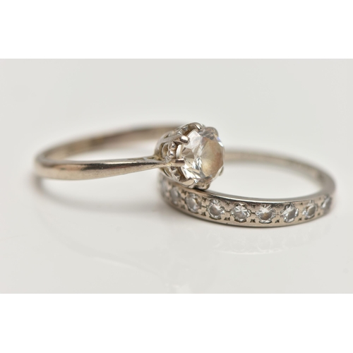 162 - A DIAMOND HALF ETERNITY RING AND AN 18CT GOLD PASTE RING, the first designed as a line of eleven bri... 