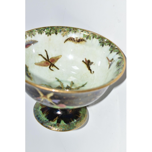 340 - A WEDGWOOD FAIRYLAND LUSTRE PEDESTAL BOWL, designed by Daisy Makeig-Jones, pattern no Z4968, the ext... 