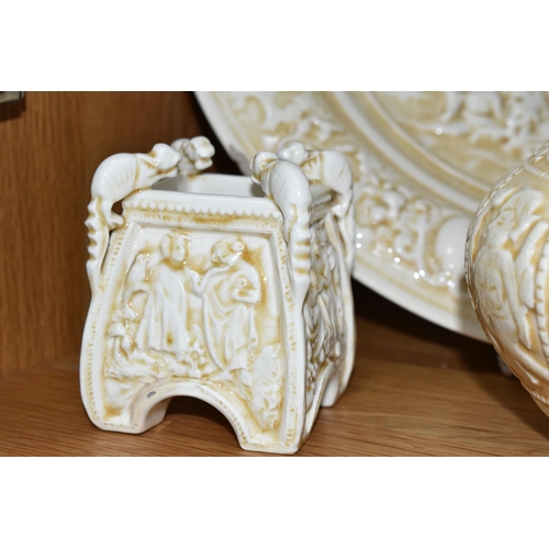 343 - THREE PIECES OF CREAM ZSOLNAY 'OLD IVORY' WARES, comprising a charger with relief figural classical ... 