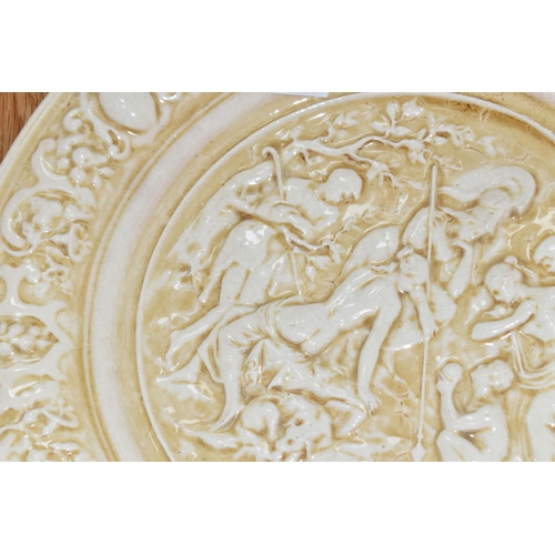 343 - THREE PIECES OF CREAM ZSOLNAY 'OLD IVORY' WARES, comprising a charger with relief figural classical ... 