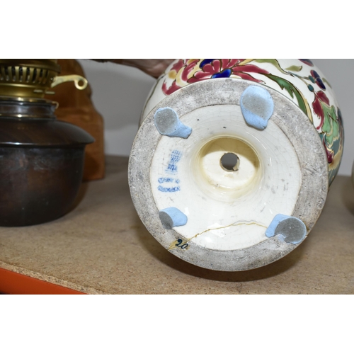 350 - A ZSOLNAY PORCELAIN OIL LAMP BASE AND RETICULATED ZSOLNAY VASE, the oil lamp is painted with an Orie... 